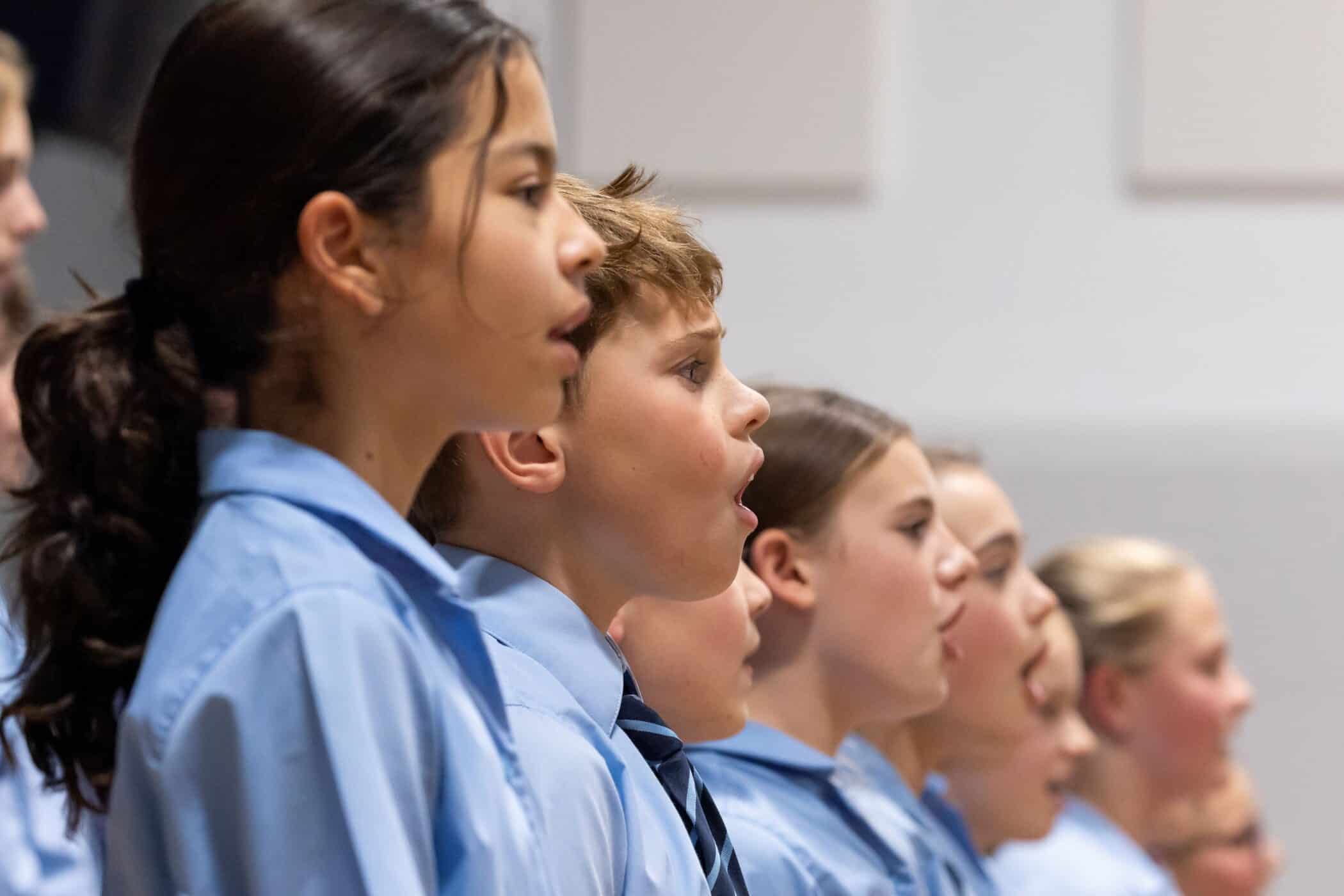 Cranleigh Prep students in line and singing for the Autumn Concert