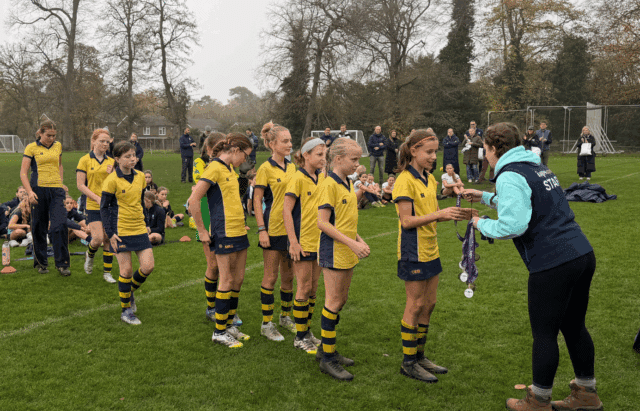 Cranleigh U15 girls receiving medals at IAPS