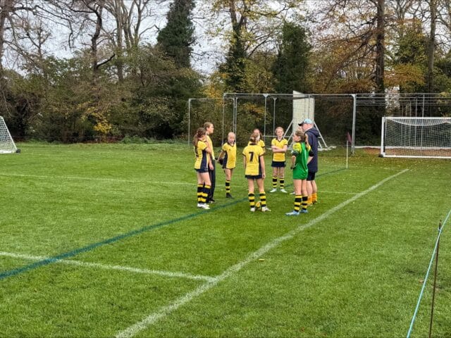 Cranleigh Prep students on a football pitch at IAPS