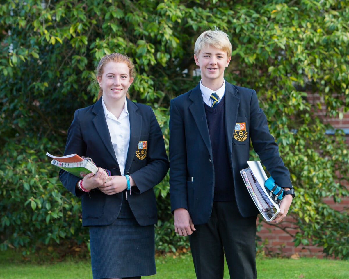 Boy and girl wearing Cranleigh School Uniform