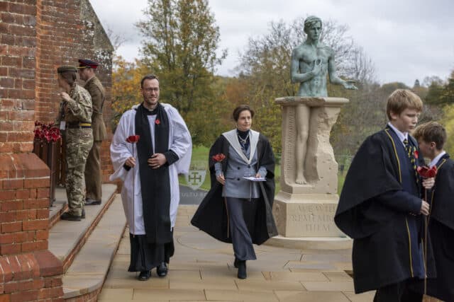 The Cranleigh Head and Reverend in traditional gowns for remembrance service