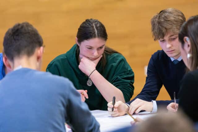Cranleigh pupils working together on a maths problem